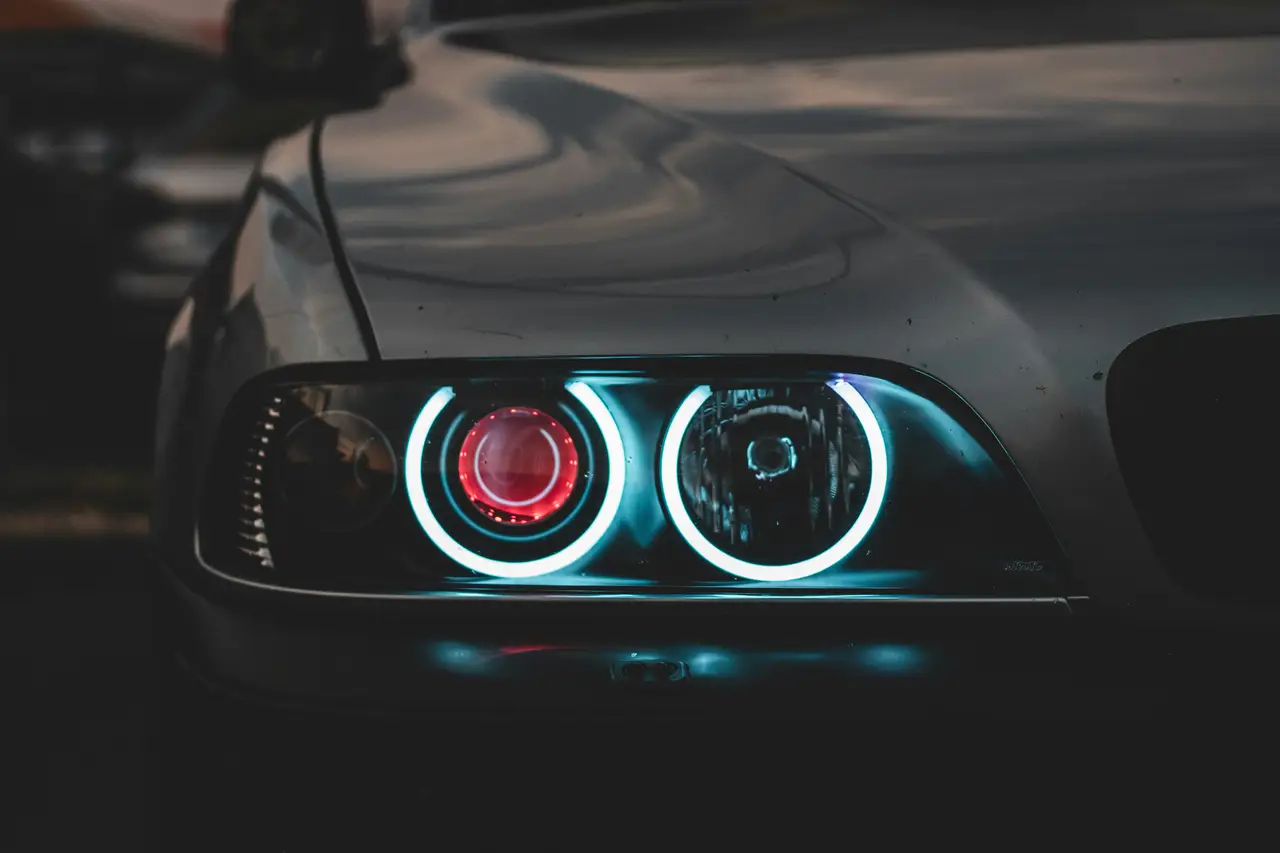Close detail of illuminated performance car headlights